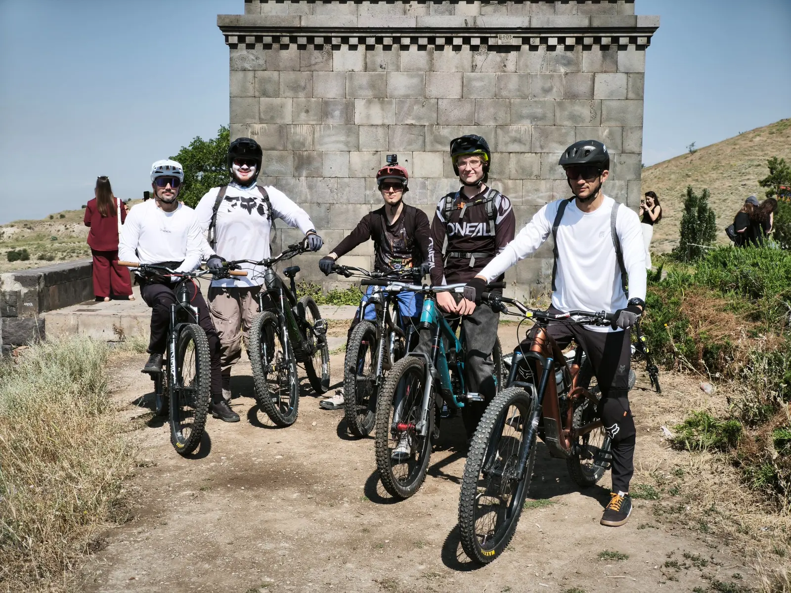 Five mountain bikers from the Voghjaberd Trails community
